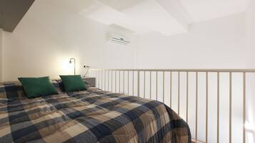 2 dormitorios, tabla de planchar con plancha, wifi gratis y ropa de cama