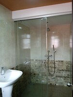 Shower, towels, soap, shampoo