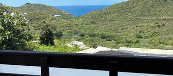 2-bedroom condo with WiFi, AC View of water from deck Pool