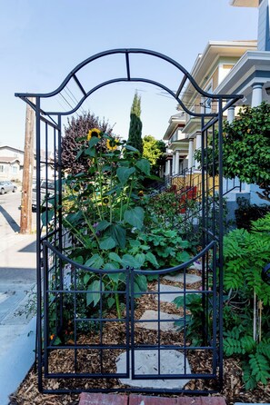 Stroll through the serene garden, surrounded by lush greenery and vibrant flowers.