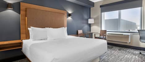 Standard Room, 1 King Bed, Non Smoking (Shower Only) | Blackout drapes, iron/ironing board, bed sheets