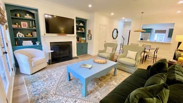 Smart TV, fireplace, books