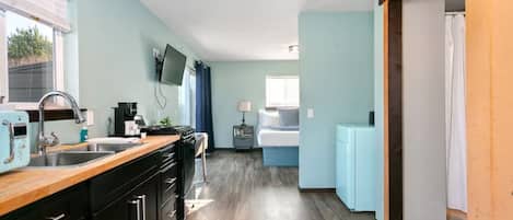 Fridge, cookware/dishes/utensils, dining tables