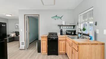 Fridge, cookware/dishes/utensils, dining tables