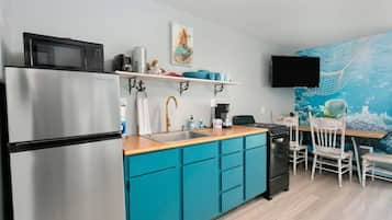 Fridge, cookware/dishes/utensils, dining tables