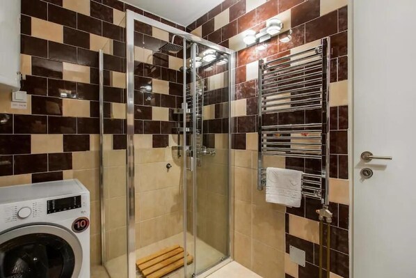 Hair dryer, towels, soap, toilet paper