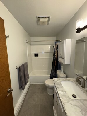 Hair dryer, towels, soap, toilet paper