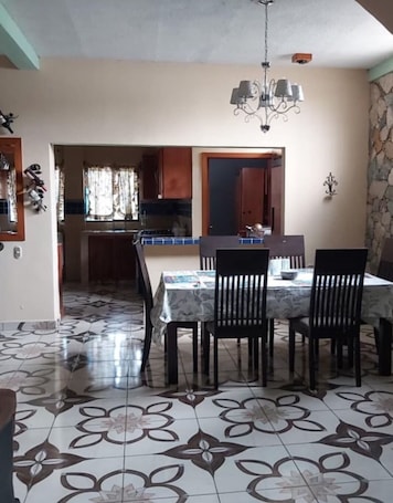 Dining. Spacious 5-bedroom house in charming Ahuachapán with WiFi, AC