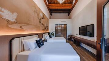 Superior Twin Room, Garden View | Laptop workspace, free WiFi