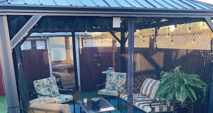 Riverfront Family Home w/ Fully Fenced Backyard, screened in front porch, BBQ