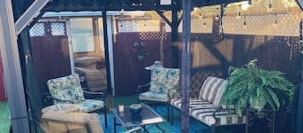 Riverfront Family Home w/ Fully Fenced Backyard, screened in front porch, BBQ