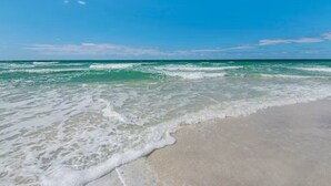 A beach with clear turquoise water and a sandy shore. - Gulf Front 2 Bedroom in High Pointe with Amazing Views - 35E (Inlet Beach)