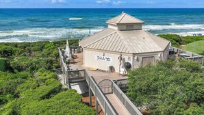 A coastal building with a sign reading "3A Crabby Steels" and a deck overlooking the ocean. - Gulf Front 2 Bedroom in High Pointe with Amazing Views - 35E (Inlet Beach)