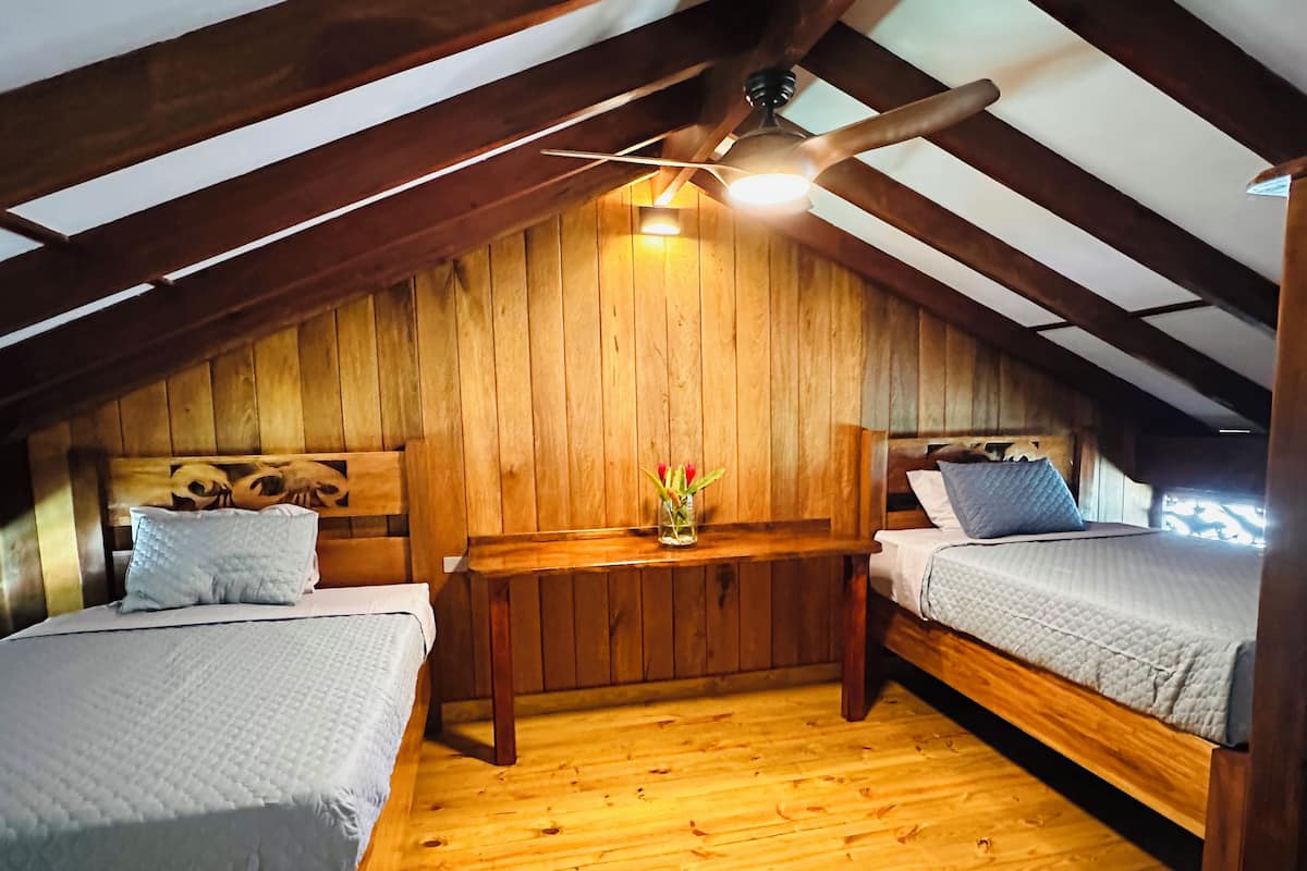 1 bedroom, premium bedding, blackout curtains, iron/ironing board