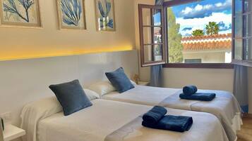 Iron/ironing board, travel crib, free WiFi, bed sheets