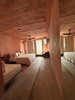 Deluxe Triple Room, 1 Bedroom, Partial Ocean View | Minibar, in-room safe, free WiFi, bed sheets