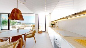 A modern kitchen with white cabinets, a wooden countertop, and a pendant light. - 501 Mirasol eme by Maison El Ático (Arenales Del Sol, Los)