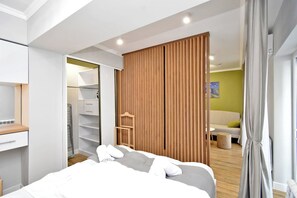 1 slaapkamer, een strijkplank/strijkijzer, wifi, beddengoed