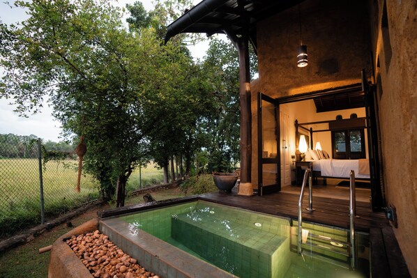 Deluxe Suite, 1 Bedroom, Private Pool, Pool View | 1 bedroom, in-room safe, desk, laptop workspace