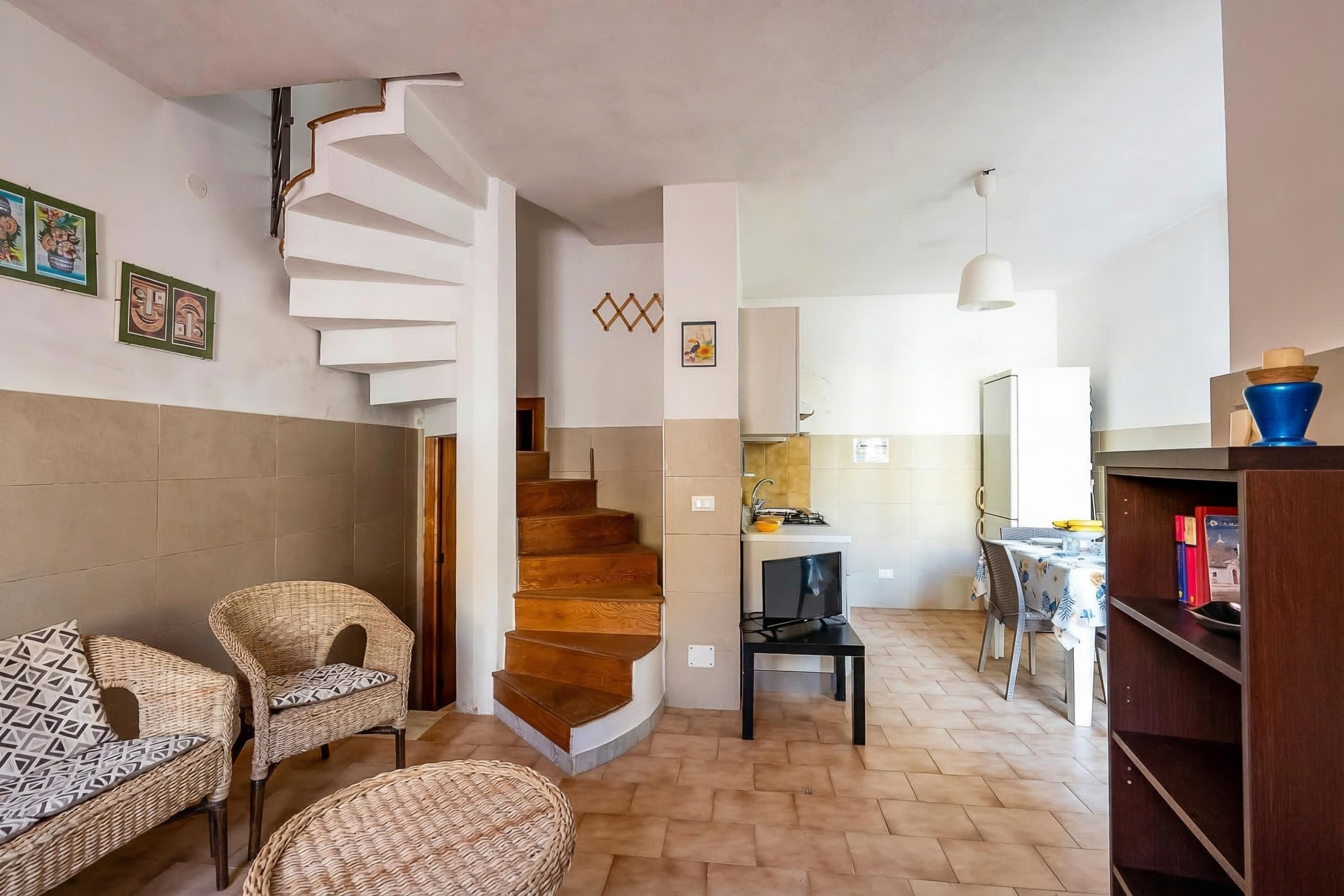 Family House, Multiple Bedrooms, 2 Bathrooms (Villino Sole 3 AIRCO near Beach & ) | Living area | 21-inch flat-screen TV with cable channels