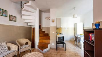 Family House, Multiple Bedrooms, 2 Bathrooms (Villino Sole 3 AIRCO near Beach & ) | Living area | 21-inch flat-screen TV with cable channels