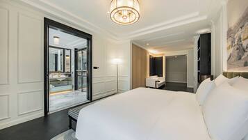 Deluxe Double Room, River View | Free minibar, desk, laptop workspace, blackout drapes