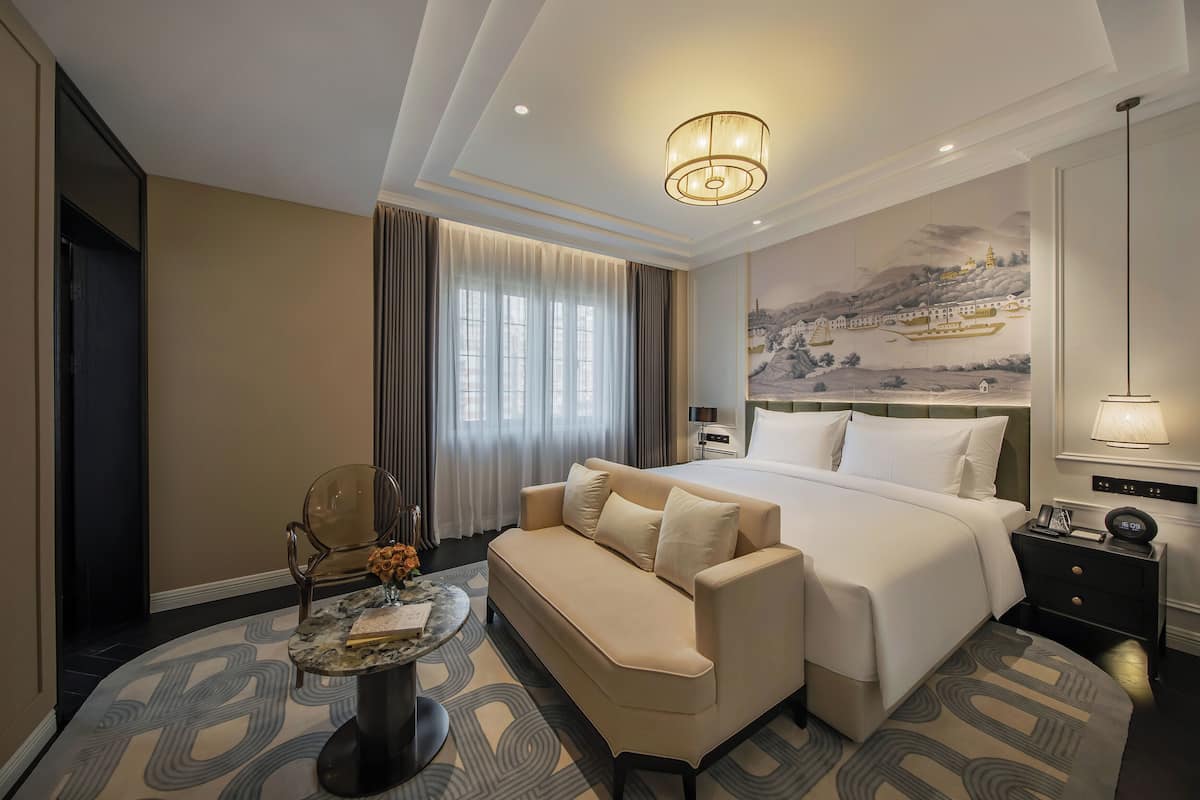 Phòng Suite dành cho gia đình | Minibar với thức uống miễn phí, bàn 