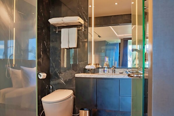 Shower, bidet, towels, soap