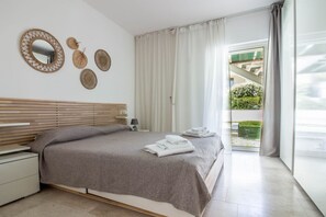 1 bedroom, iron/ironing board, WiFi, bed sheets - GuestHost - Modern apartment of 58 sqm located on the ground floor of a building without elevator, perfect for 4 people.The property is situated in the magnificent aquamarine residence with swimming pool and communal garden. The area is provided by all m (Pittulongu)