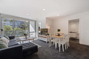 TV, offices - Central Braddon Retreat with Balcony & Pool Access (Turner)