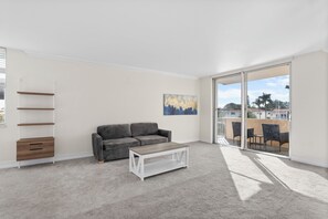 Apartment, Balcony, Bay View | Living room | Flat-screen TV - Bay Harbor Sunset Apt 3C (Bay Harbor Islands)