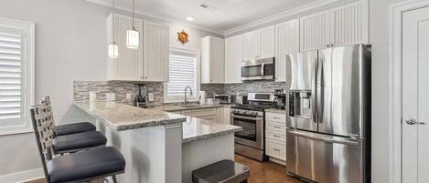 Fridge, dishwasher, coffee/tea maker, blender