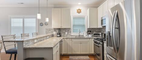 Fridge, dishwasher, coffee/tea maker, blender