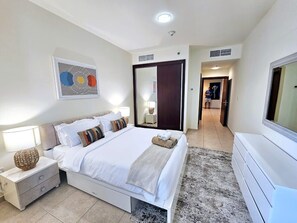 1 bedroom, desk, iron/ironing board, travel crib