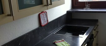 FW Sagitta with view of the container port, 14th floor SpeckenbĂŒttler Park