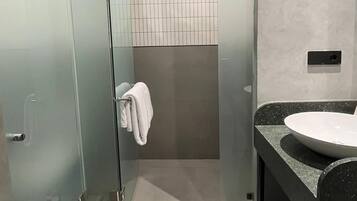 Shower, free toiletries, hair dryer, slippers