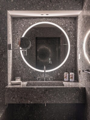 Separate bathtub and shower, hair dryer, slippers, towels