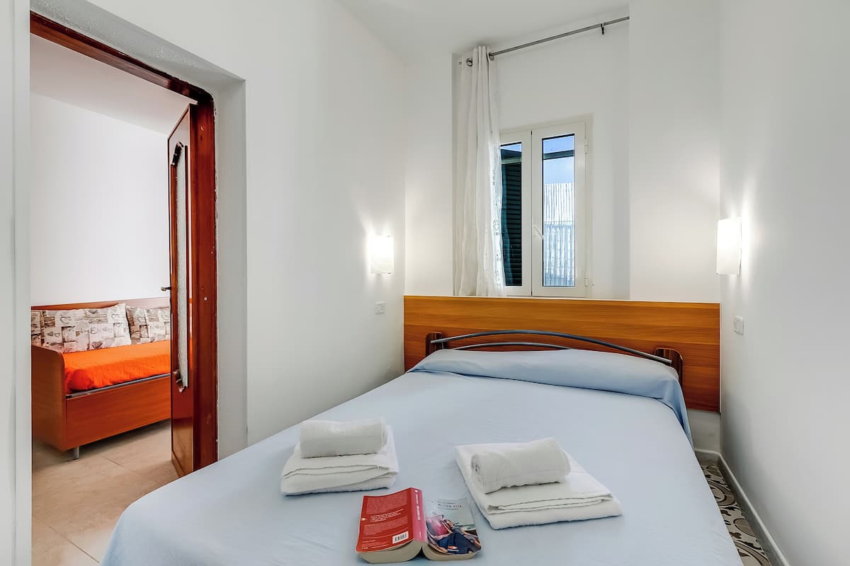 Family Apartment, 2 Bedrooms (Stella Marina Apartment 7) | 1 bedroom, bed sheets