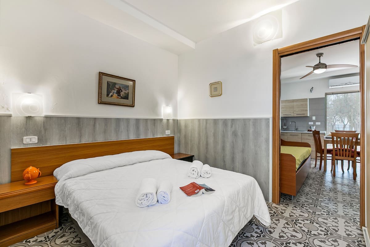 Family Apartment, 1 Bedroom (Stella Marina Apartment 3) | 1 bedroom, bed sheets