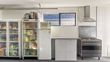 Mini-fridge, microwave, cookware/dishes/utensils