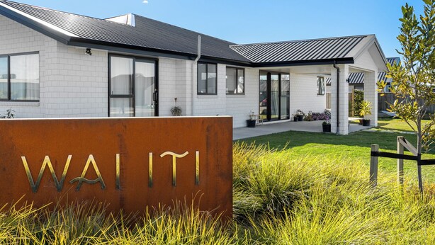 A modern building with a sign reading "WAIITI". - Blenheim Accommodation (Blenheim)