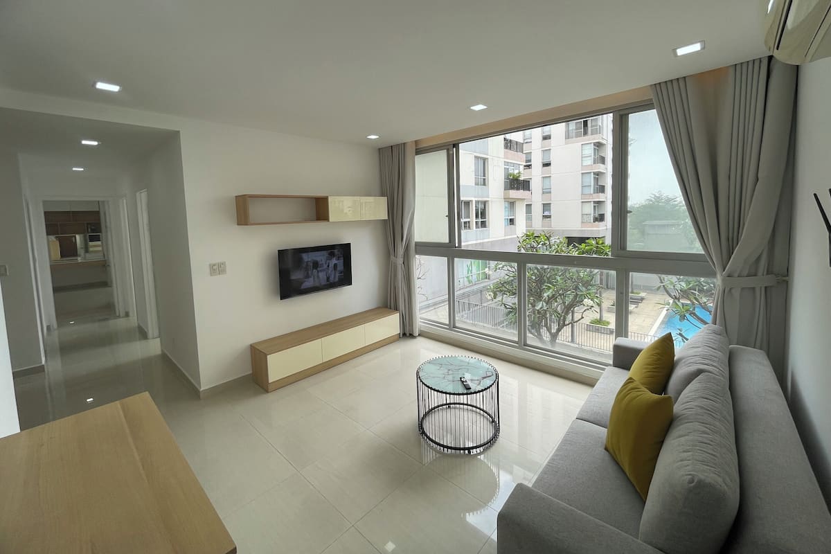 Standard Apartment, 3 Bedrooms, Pool View | Living area | 20-inch flat-screen TV with digital channels