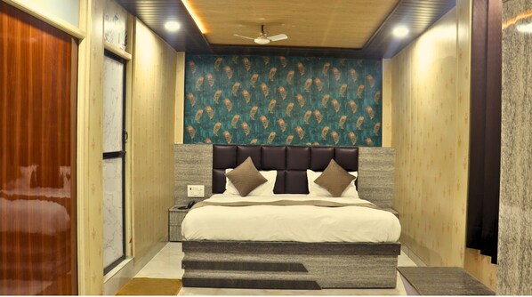 Habitación triple Deluxe | 1 dormitorio y wifi gratis