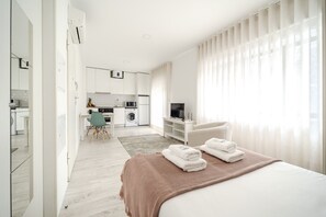 1 dormitori, planxa i posts de planxar, wifi gratuïta i roba de llit 