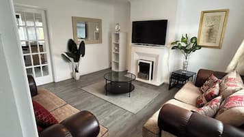 Ferienhaus | Wohnbereich | Fernseher