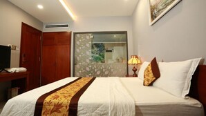 Kamar Double Standar | Meja kerja, Wi-Fi gratis, dan seprai linen