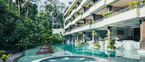 Outdoor pool, open 7:00 AM to 7:00 PM, pool umbrellas, pool loungers