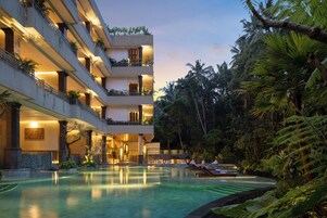 Outdoor pool, open 8:00 AM to 8:00 PM, pool umbrellas, pool loungers