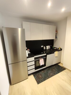 Réfrigérateur, four, plaque de cuisson, lave-vaisselle