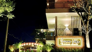 A two-story building with a neon sign reading "Serena Villa." - Serena Tam Coc Hotel & Villa (Nam Hoa Lu)
